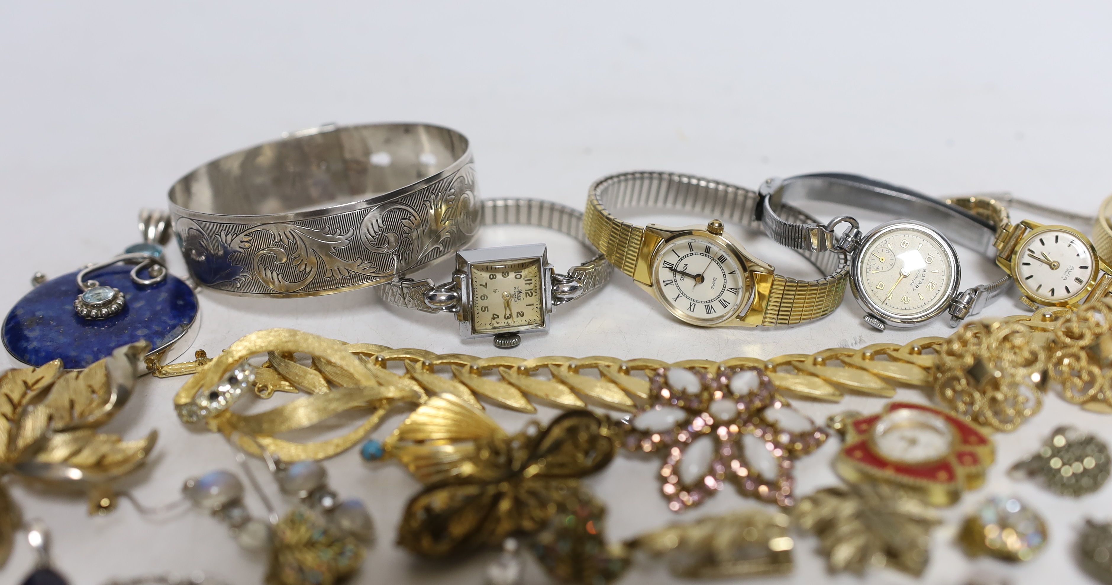 A mixed group of wrist watches including Rotary and 9ct gold Accurist and jewellery including 925 and costume.